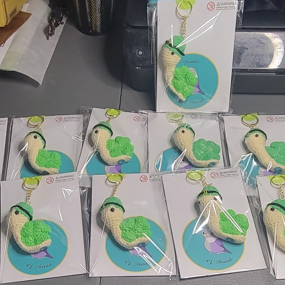 Crochet st Patrick's day snail keychains